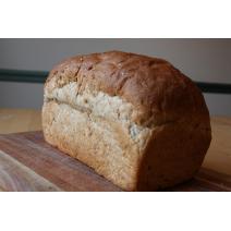 Small Unsliced Multiseed Bread Image